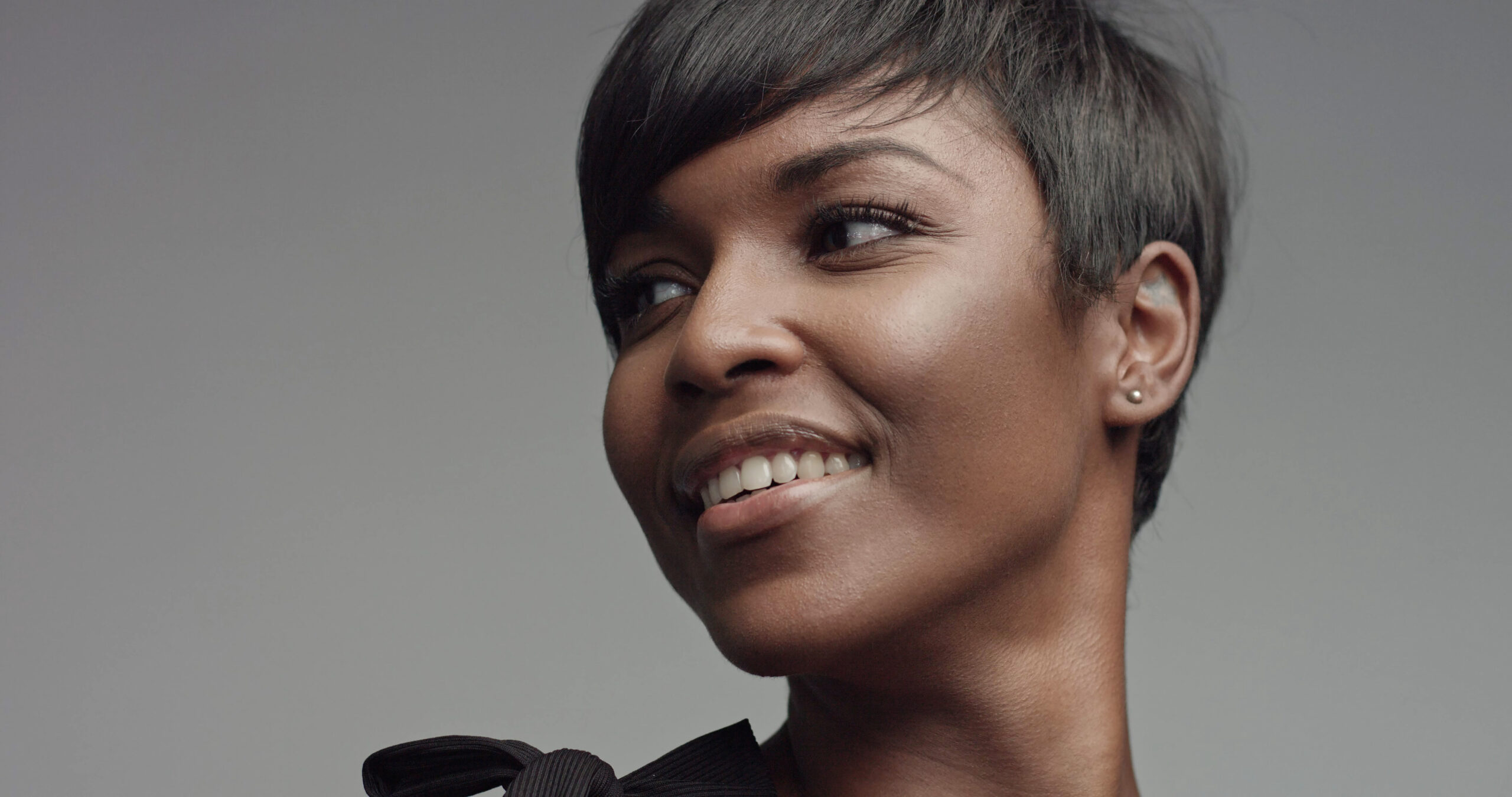 beauty black woman portrait closeup short haircut, softlight